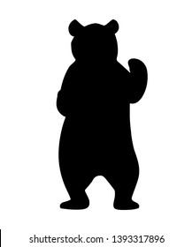 Black silhouette. Grizzly bear. North America animal, brown bear. Cartoon animal design. Flat vector illustration isolated on white background. Bear stand on two legs, front view.