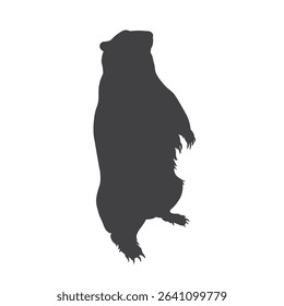 Black silhouette of a groundhog or woodchuck standing upright on its hind legs. Vector illustration of a marmot isolated on white background for wildlife, nature. and seasonal designs.