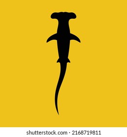 Black silhouette of Hammerhead shark, giant apex predator cartoon animal design flat vector illustration isolated on yellow background