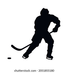 Black silhouette of hockey player. Winter sport icon. Isolated drawing of athletic man. Vector illustration