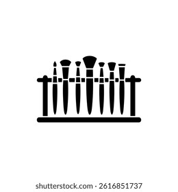 Black Silhouette Icon of Collection of Brushes in Drying Rack for Art Workspace