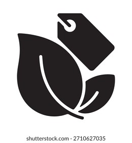 Un icono de silueta negro con dos hojas y una etiqueta, que representa productos ecológicos y prácticas sostenibles.