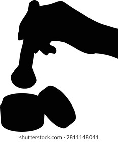 A black silhouette image depicting a person holding a baseball bat above a round object, possibly a ball. The figure is positioned dynamically, with the bat raised as if preparing to swing. The minimalist design emphasizes the action and the shapes involved.