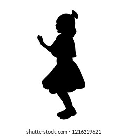 black silhouette of a little girl dancing