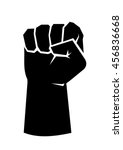 Black silhouette of a male rising fist on a white background with white lines defining fingers and thumb. Symbol of freedom, fight, revolution, unity, strength and struggle. Simple, basic illustration