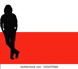 Black silhouette of a man in a full-length hood on the background of the Polish flag. Vector illustration