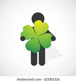 black silhouette of a man holds the four-leaf clover