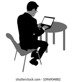 Black silhouette man sitting behind computer, on a white background