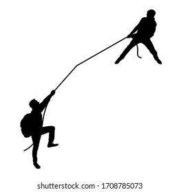 Black silhouette of men. The man pulls another rope. Teamwork. Tourists, travelers, climbers, adventurers, hiking. Mountain trip.