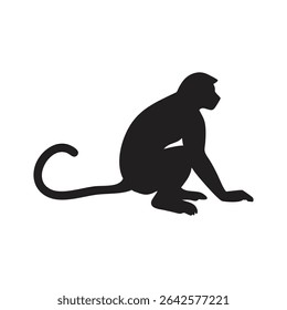 a black silhouette of a monkey sitting down