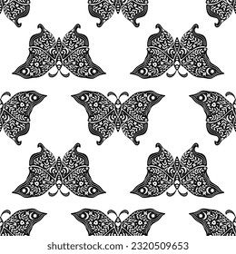 Black silhouette of a moon moth seamless pattern. Black magic insect on white background. Celestial seamless pattern with flowers. Linocut style. Design for boho print, fabric, apparel. 