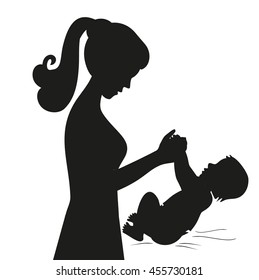 Black silhouette mother and baby playing vector illustration. Mom and baby  isolated on white background. Mom and newborn silhouette.