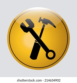 a black silhouette of a pair of tools on a yellow round signal