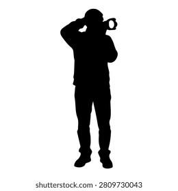 A black silhouette of a person holding a camera up to their eye, capturing a photograph, against a plain white background.
