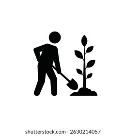 Black silhouette of a person planting a small tree in the ground for growth