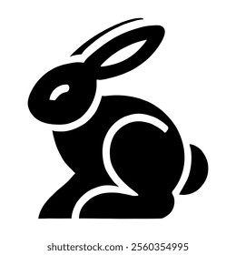 A black silhouette of a rabbit in a seated position against a plain white background