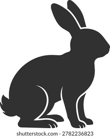 A black silhouette of a rabbit in a sitting position, with its ears pointed upwards.