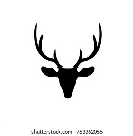 Black silhouette of reindeer head with big horns isolated on white background. Vector illustration, icon, sign, symbol of deer. 