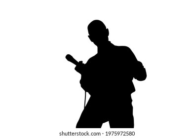 Black silhouette of a rock singer with a microphone in his hand on a white background. 