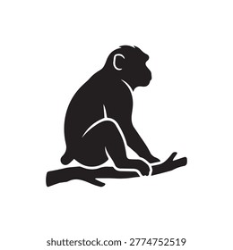 Black silhouette of small monkey sitting on tree branch isolated on white background