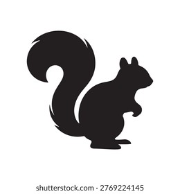 Black silhouette of a squirrel standing on hind legs