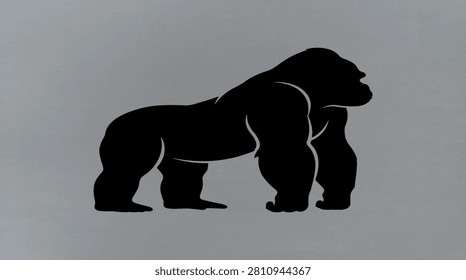 Black silhouette of a strong silverback gorilla standing on all fours
