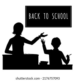 Black silhouette of teacher and pupil at their desks pointing to blackboard, vector illustration, eps10