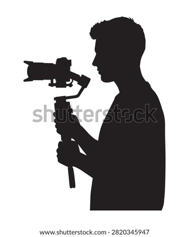 A black silhouette of a videographer holding a camera stabilizer gimbal for capturing smooth cinematic footage.