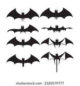 Black silhouettes of bats set on white isolated background.