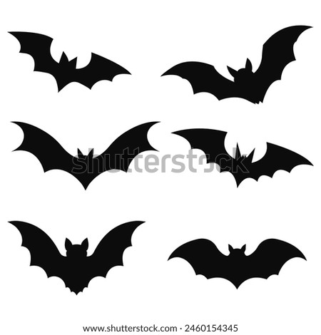 Black silhouettes of bats set on white background.