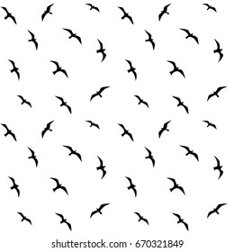 Black silhouettes of birds on white background. Seamless pattern. Vector image.