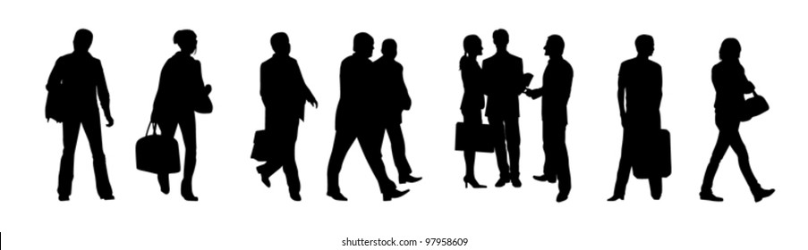 Black silhouettes of business people on the white background