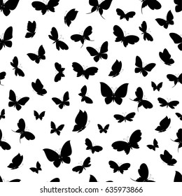 Black silhouettes of butterflies on a white background seamless pattern. Vector illustration