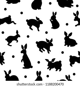 Black silhouettes of Easter bunnies. Seamless background pattern. Set. Cartoon vector element.