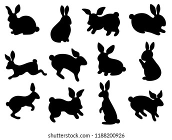 Black silhouettes of Easter bunnies. Seamless background pattern. Set. Cartoon vector element.