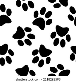 Black silhouettes of paws. Seamless pattern with paw prints of pets, dogs, cats. Animal trail. Doodle dog paws seamless background. Cute and funny cartoon style. Pet shop. Veterinary. 