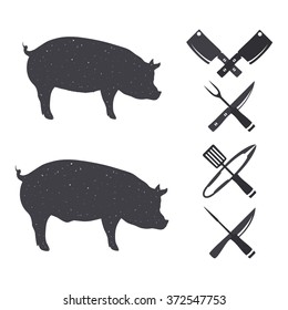 Black silhouettes of a pig and a hog. Butchery Design Elements. Isolated on a white. Vector illustration.