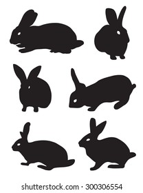 black silhouettes of rabbits