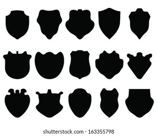 Black  silhouettes of  shields, vector