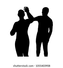 Black silhouettes of two people giving five each other. Vector illustration.