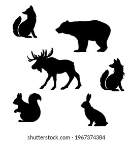 black silhouettes of wild animals living in the forests. moose, fox, wolf, bear, squirrel and hare