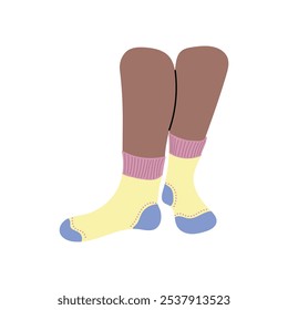 Black skin female legs in yellow socks with blue and pink details on white background. Hand drawn vector illustration in flat style. Textile, sport clothes brand, children. Concept of diversity