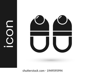 Black Slippers icon isolated on white background. Flip flops sign.  Vector