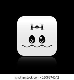 Black Smart farm with drone control and tree icon isolated on black background. Innovation technology for agricultural company. Silver square button. Vector Illustration