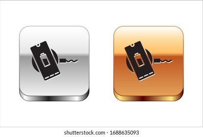 Black Smartphone charging on wireless charger icon isolated on white background. Charging battery on charging pad. Silver-gold square button. Vector Illustration