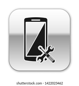 Black Smartphone with screwdriver and wrench icon isolated on white background. Adjusting, service, setting, maintenance, repair, fixing. Silver square button. Vector Illustration