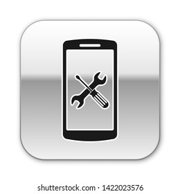 Black Smartphone with screwdriver and wrench icon isolated on white background. Adjusting, service, setting, maintenance, repair, fixing. Silver square button. Vector Illustration