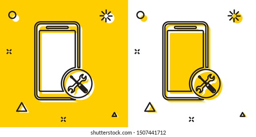 Black Smartphone with screwdriver and wrench icon isolated on yellow and white background. Adjusting, service, setting, maintenance, repair, fixing. Random dynamic shapes. Vector Illustration