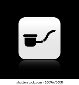 Black Smoking pipe with smoke icon isolated on black background. Tobacco pipe. Silver square button. Vector Illustration