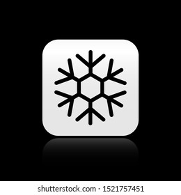 Black Snowflake icon isolated on black background. Silver square button. Vector Illustration